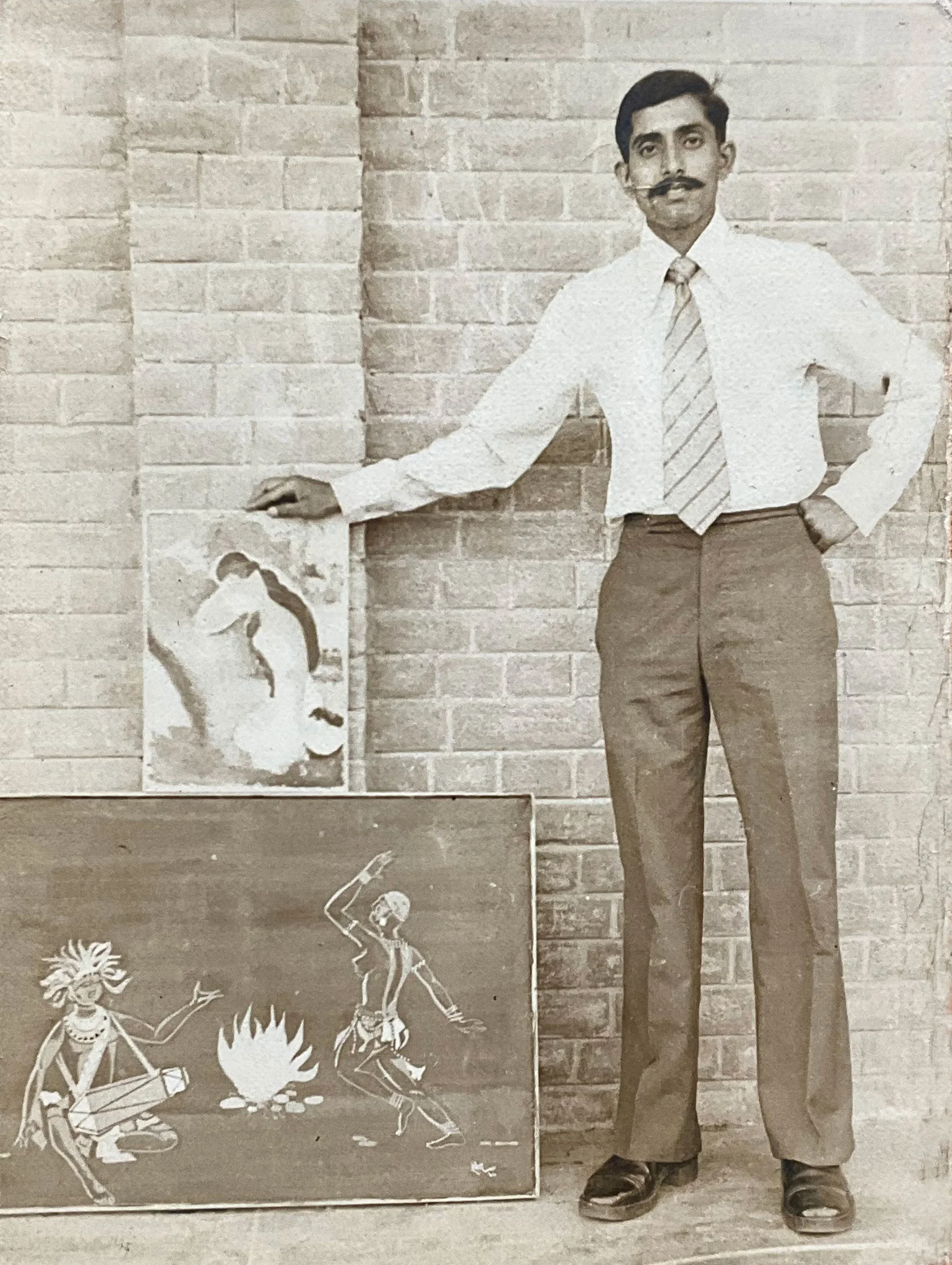 As a gentleman Cadet, standing with my paintings, December 1976
